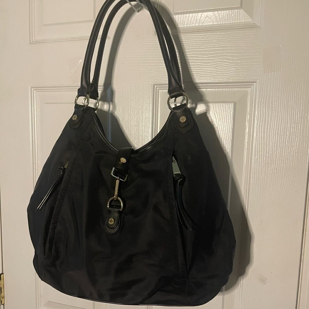 Calvin Klein Black Nylon large shoulder bag with gold tone hardwares.